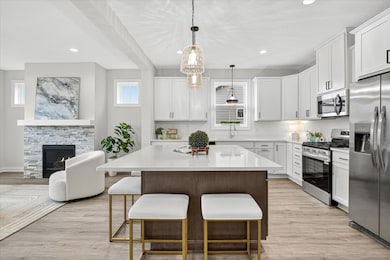 Step inside to find an open-concept floor plan, upgraded finishes, and thoughtful details throughout.