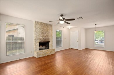 Unfurnished living room featuring healthy amount 