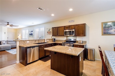 Kitchen featuring appliances with stainless steel