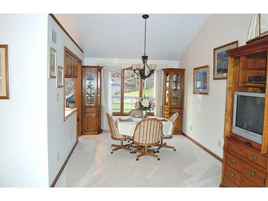 Dining Room. Bright and airy dining room flows to 