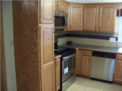 View of the pantry and new appliances, all cabinet