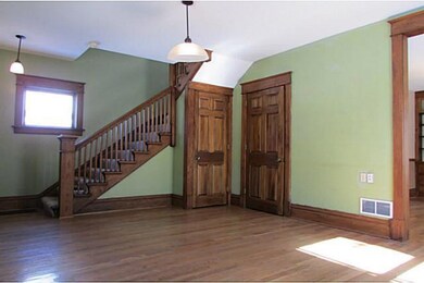 Living Room. Living Rm storage closets & stairs.