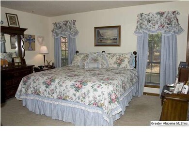 master bedroom with two walk in closets