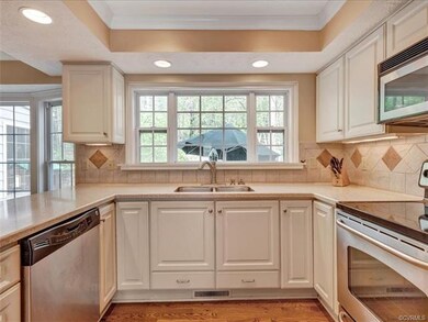 Kitchen, Corian countertops, tile backsplash, rece
