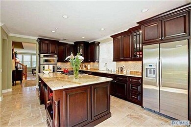 Travertine flooring on the entire first floor.