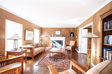 Enjoy the living room fireplace, one of three in t