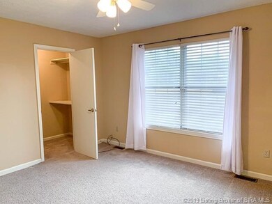 Front bedroom with walk in closet.