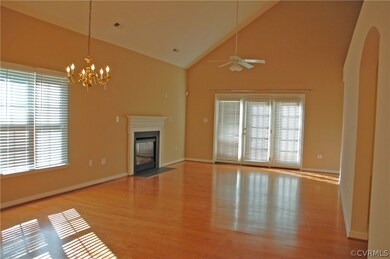 Triple French Door on the back wall leads to the p