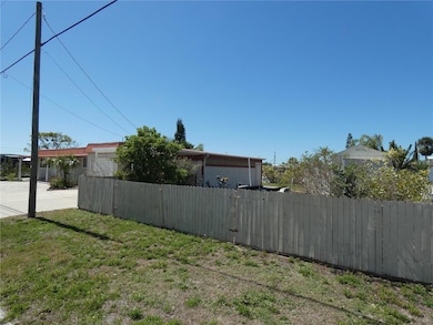 This photo shows you the entire 3 lots, with .28 acre from the front. It includes everything that is included from the right to left to include the Extra Cottage 30' X 12' solid mini home.