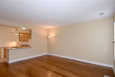 The large, open family room accented with hardwood