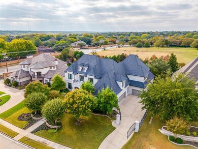 Gated driveway with a 4 car garage.