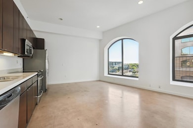 Kitchen featuring appliances with stainless steel