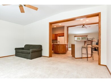 This living room also has a tuck-away office area.