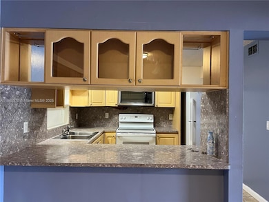 6640 W 24th Ct unit 25-106, Hialeah, FL 33016 - photo 7