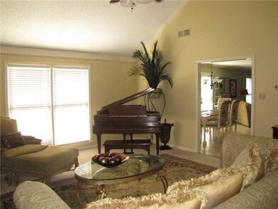 The great room opens to the kitchen for an open an