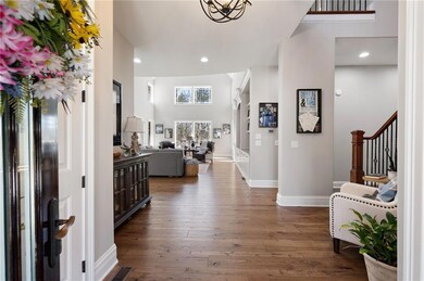 Incredible open floor plan shows off the wood floors on entire main floor