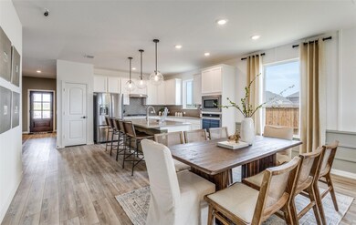 Airy dining area *Photos of furnished model. Not a
