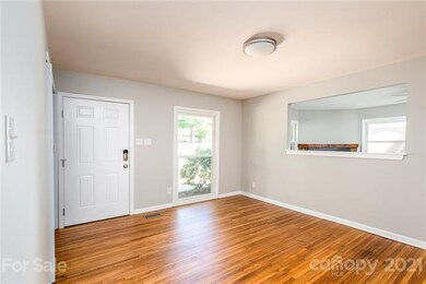 Living Room w/refinished Hardwood flooring
