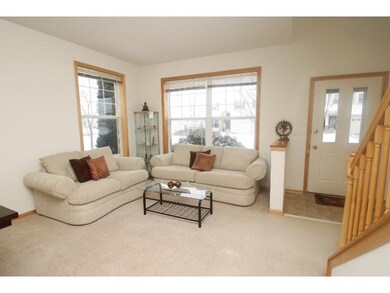 Living room with abundant natural light and front 