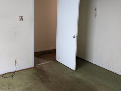 Another view of the primary bedroom