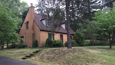 Charming Brick home sits on large lot with mature 