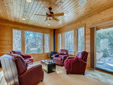 The knotty pine, four season room addition is warm