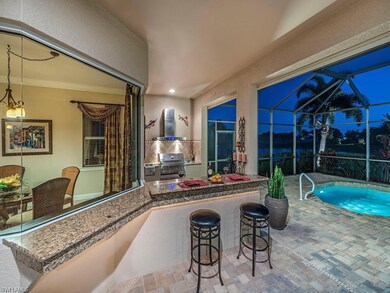 Custom outdoor kitchen with dinner/lunch bar