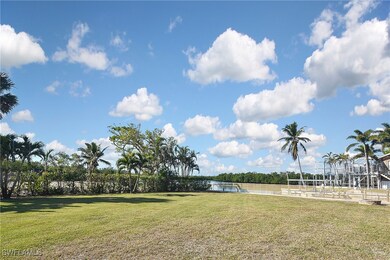 View of yard with a water view