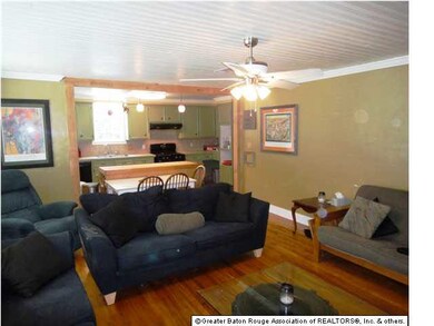 LIVING ROOM IS OPEN AND AIRY