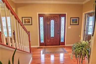 A New Custom Front Door and a Nice Size Foyer to G