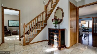 Welcoming, two story foyer and stairs to bedroom l