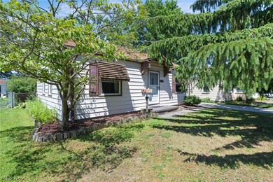 View of front of property with a front yard