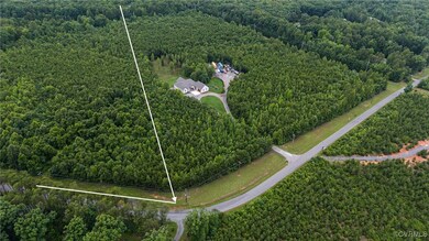 Aerial view of property and surrounding area with