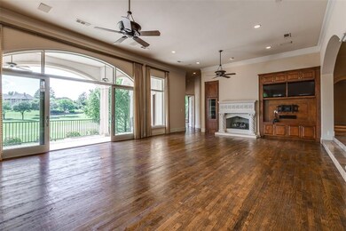 Expansive living area with built- ins, stone firep