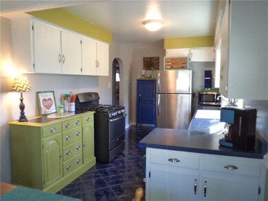 Cheerful and sunny kitchen equipped with appliance