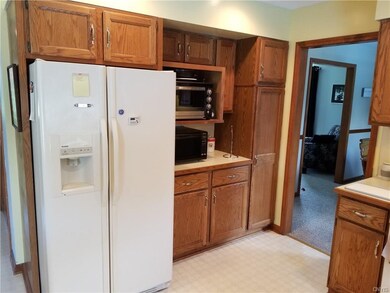 The kitchen has great space and light, and an incl
