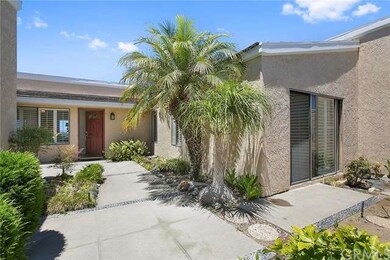 large private courtyard behind wrought iron gate..