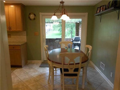Dining Room. EAT-IN KITCEH AREA WITH SLIDING DOORS