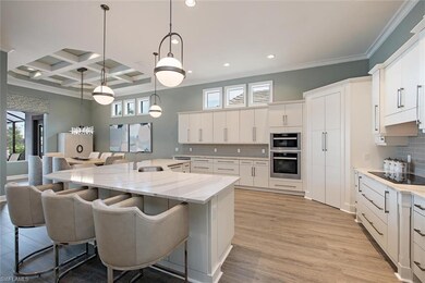 The kitchen and dining room with volume ceilings a