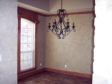 Formal Dining Room with rubbed oil fixture