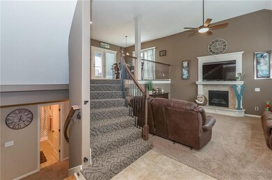MULTIPLE WIDE CURVED STAIRCASES ENHANCES THE OPEN 
