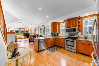 Spacious kitchen with granite countertops.