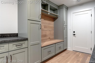 Mudroom featuring light wood-style flooring