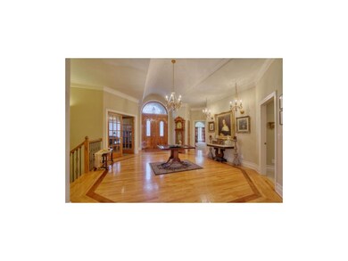 Grand Entry with Hardwood Floors