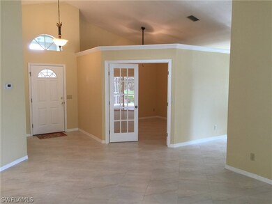 View of the front entry and the den.