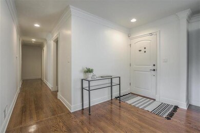 Hall towards bedrooms and guest half bath.