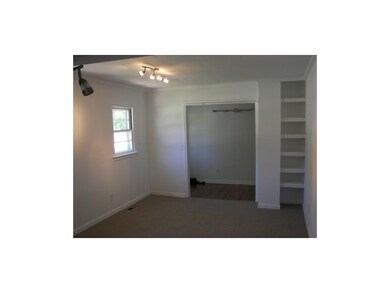 Spacious living room off hall entry with built-in 