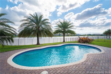 FENCED-IN BACKYARD WITH SWIMMING POOL / LAKE VIEW