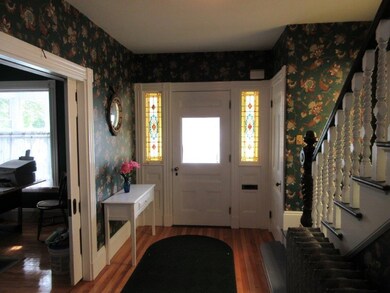 Stunning Foyer with Pocket doors to...