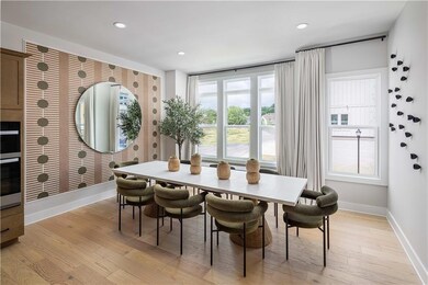 Dining area featuring light hardwood / wood-style 
